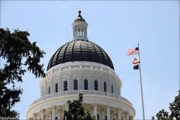 California governor signs bill lifting state travel ban