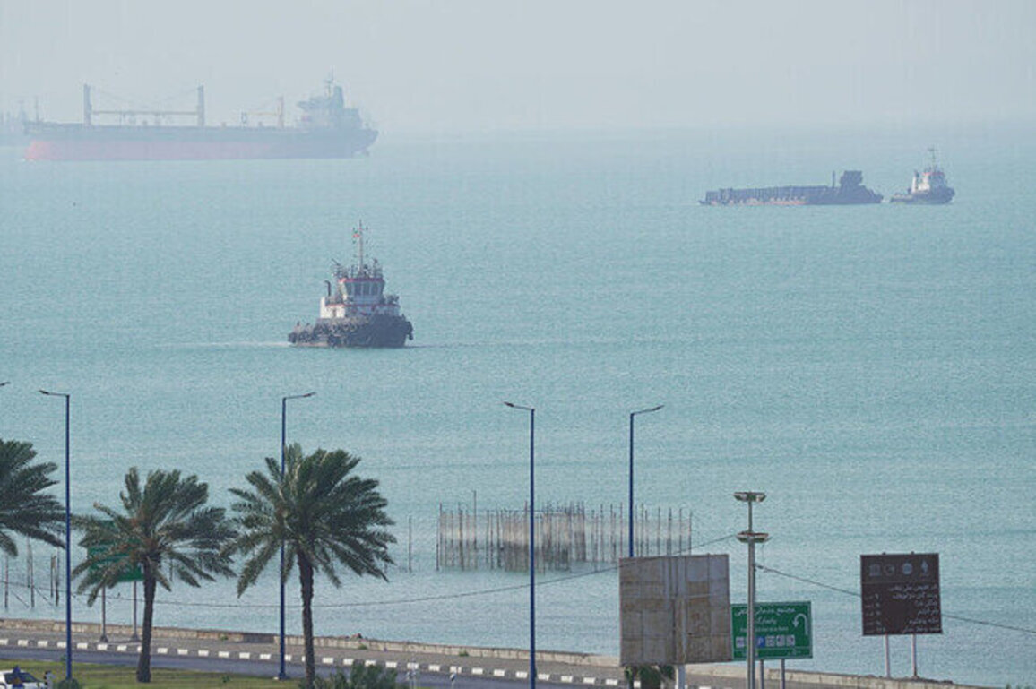 Two cargo vessels struck near Strait of Hormuz  monitor