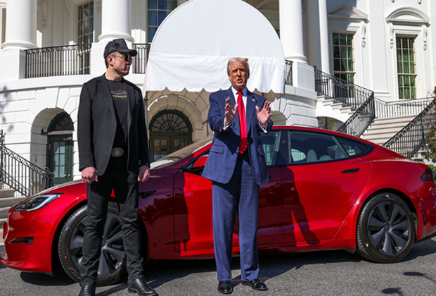 Trump buys "beautiful" red Tesla at White House alongside "patriot" Musk