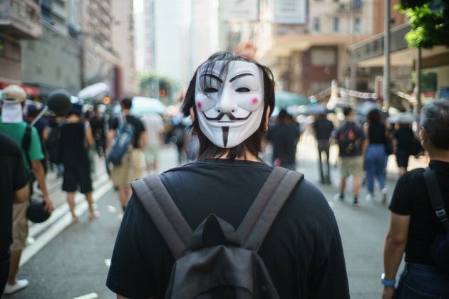 Hong Kong police make arrests as flashmob protests and clashes erupt