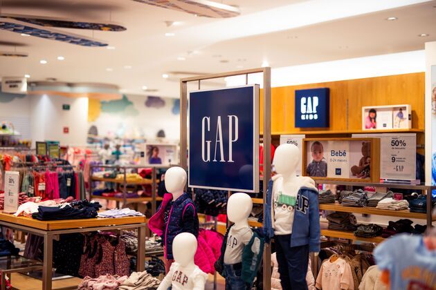 Retail giants warn of softer demand, shares slide