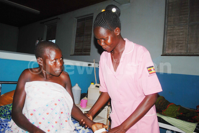  gnes okomiku  enrolled nurse attending to aida ungenia 35 who also got fistula repair during the surgical camp 