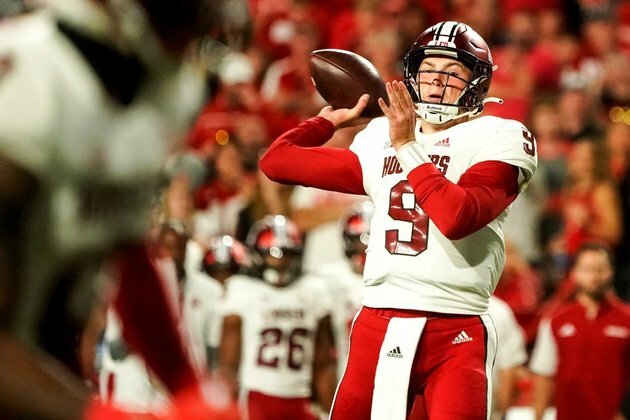 Nebraska runs away from Indiana in fourth, 35-21