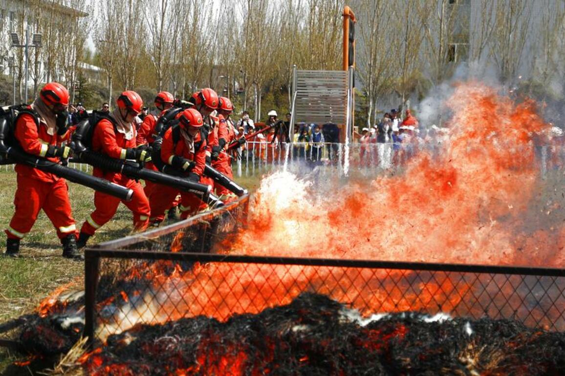 InPics | China boosts disaster awareness through publicity and training