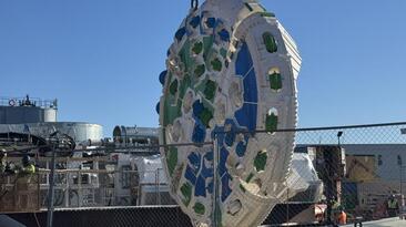 The cutterhead for the TBM Mary being lowered into place, ready for work to begin on the Potomac River Tunnel Project