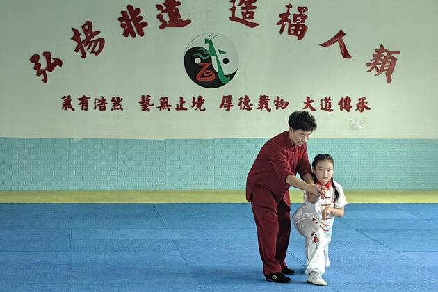 Female inheritor in east China promotes martial arts, strength, serenity