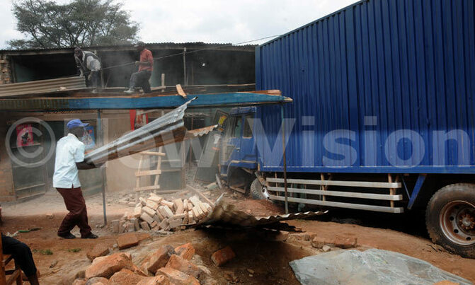 Eight cheat death as lorry rams into commercial building Eight cheat death as lorry rams into commercial building