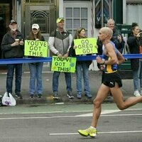 Marathon runners rely on family and experts to succeed, while races rely on passionate volunteers