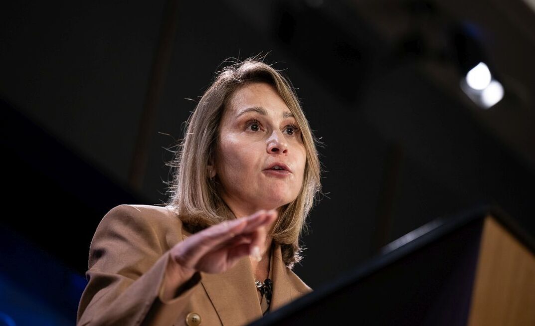 Michelle Manook speaking at the National Press Club.