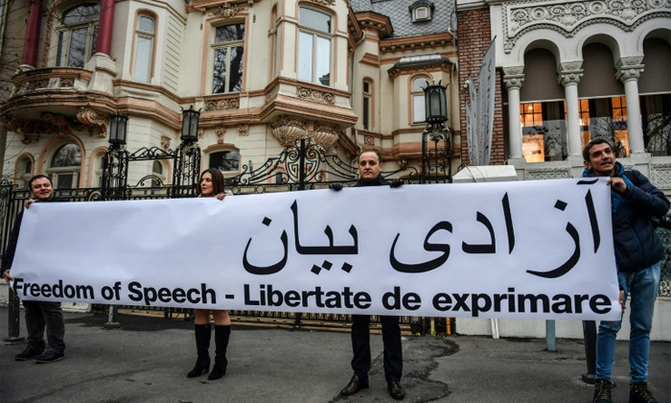 Protests as sanctioned Iran minister addresses UN rights meet Protests as sanctioned Iran minister addresses UN rights meet