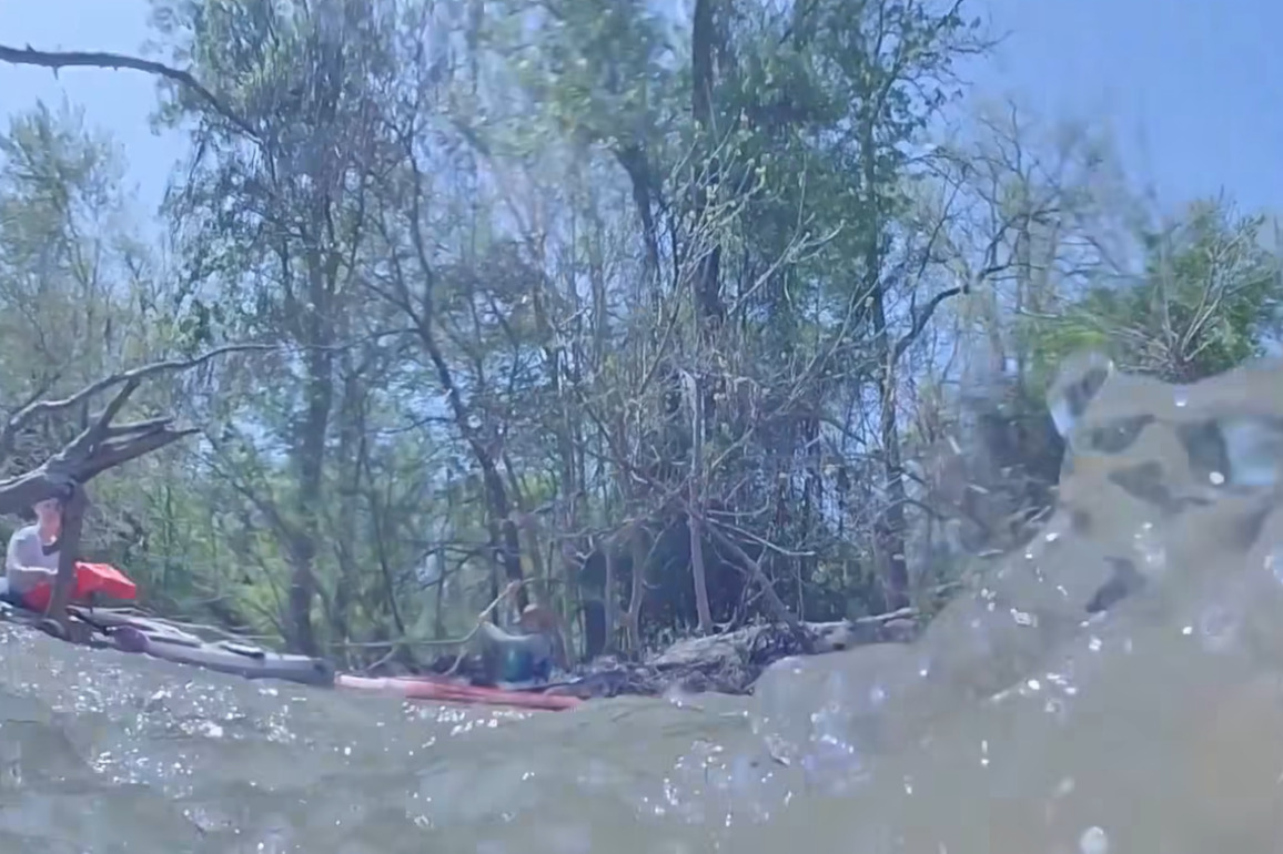 Video- Mich. officer rescues kayaker who fell into river
