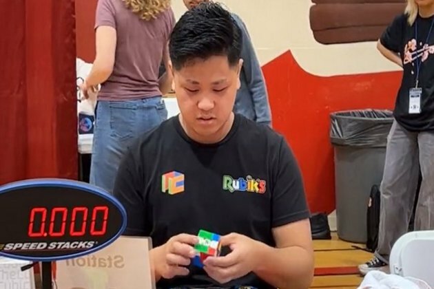 21-year-old breaks Guinness World Record for solving Rubik's cube in 3.13 seconds