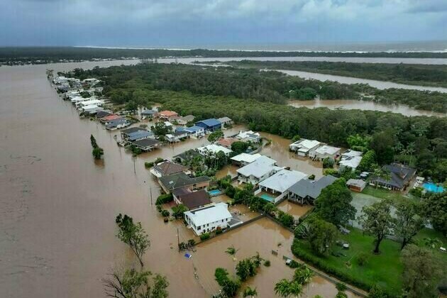 In a flood, first responders balance helping others while their own families are at risk. It's an impossible choice