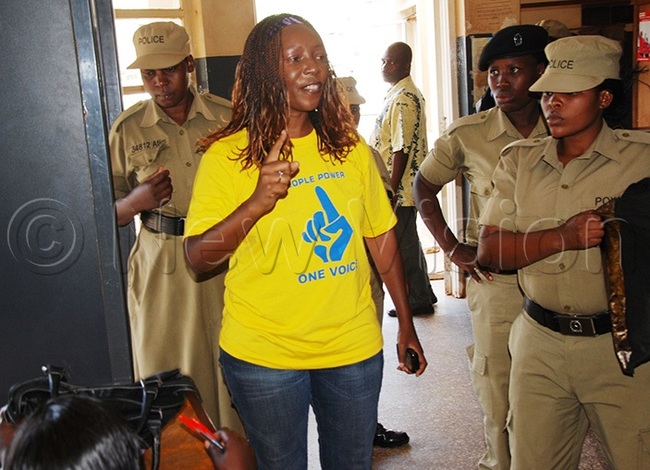  arbara limadi arrested over demonstration on une 25 2012 at arliament demanding the resignation of the then prime minister ohn atrick mama babazi hotos by iga tuart