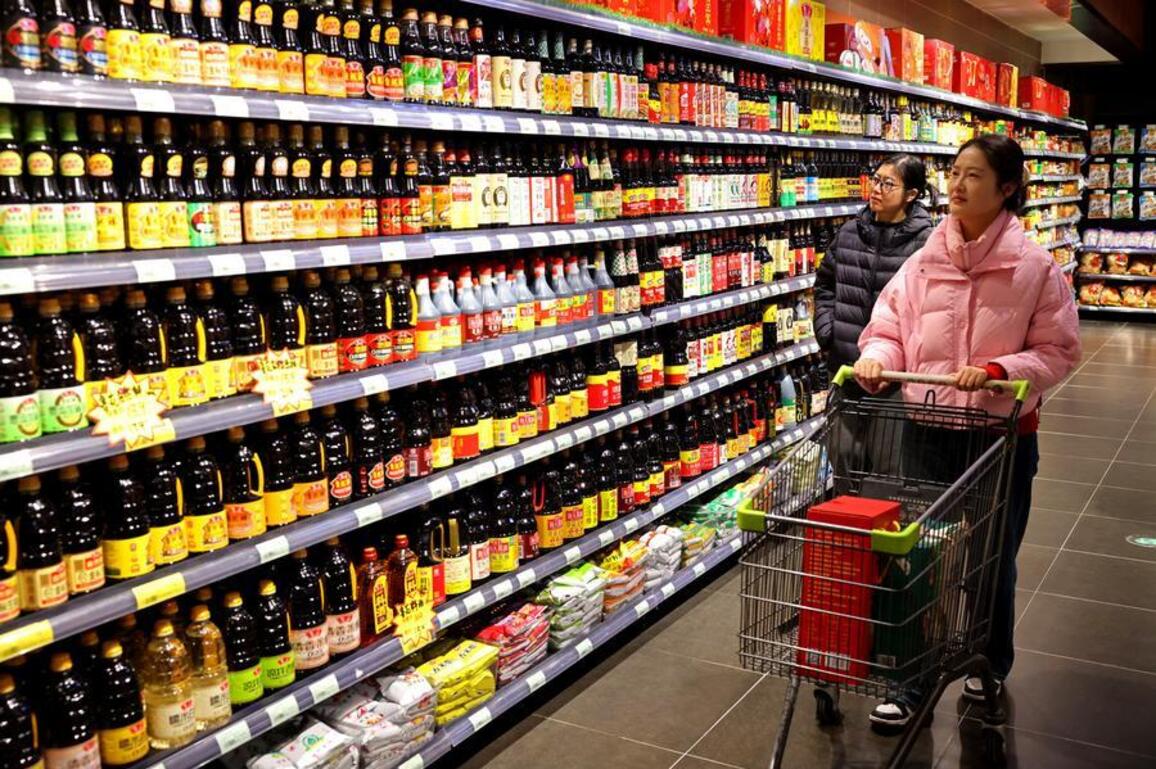Update: China inflation ticks up in December as producer price decline narrows
