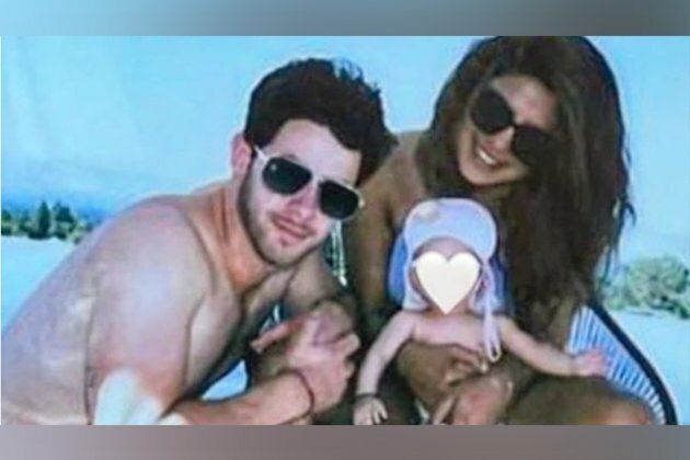 You just cannot miss this adorable photo of Priyanka-Nick with daughter Malti Marie