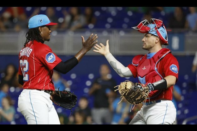 Surging Marlins vie for series sweep of Athletics