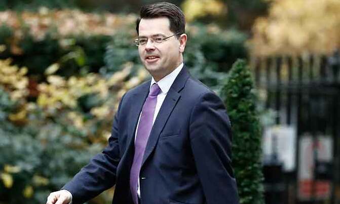 Britain's Northern Ireland minister resigns over ill-health Britain's Northern Ireland minister resigns over ill-health
