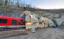 A train passing through Herrenknecht’s Tunnel Enlargement System on the Lahn Valley Railway, shortly before the start of excavation work on the Cramberg Tunnel. Credit: Herrenknecht