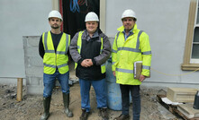   (L to R) David Brown (Kensa), Councillor James Mustoe, and George Gillow (Kensa) at the site of a new housing development that will feature a ground source heating array supplied by Kensa