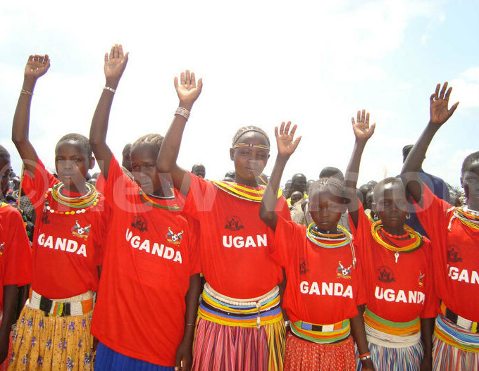 okot girls take an oath against female genital mutilation during culture day celebrations in ween district on ovember 01 2010 ile hoto