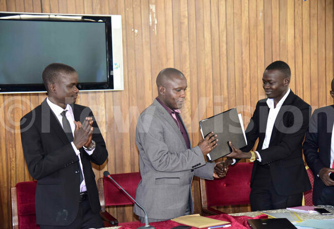  ulondo receiving  instruments of office during the handover ceremony hoto by ennedy ryema