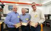  Auric directors Mark English, Steven Morris and John Utley at the Perth Mint refinery, holding Jeffreys Find gold bars. (Photo courtesy of Perth Mint)