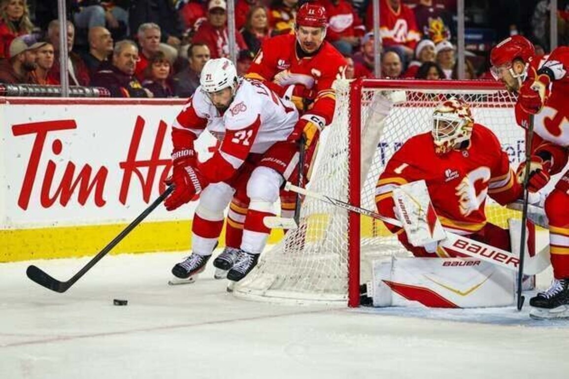 Wings build 4-goal cushion, hold on to edge Flames