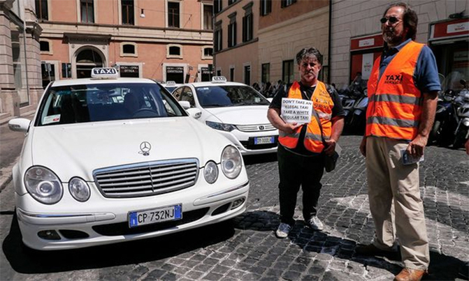 Italy taxis strike over 'Uber' benefits Italy taxis strike over 'Uber' benefits