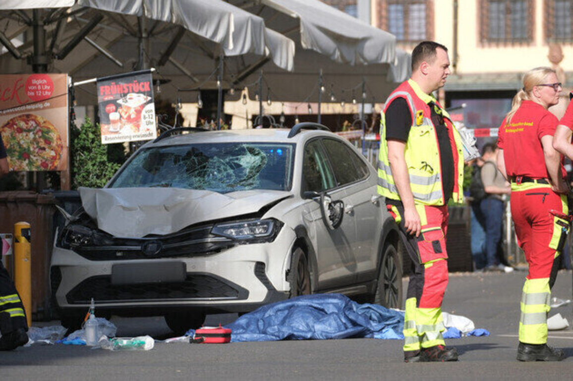 Two killed after car ploughs into crowd in Germany 