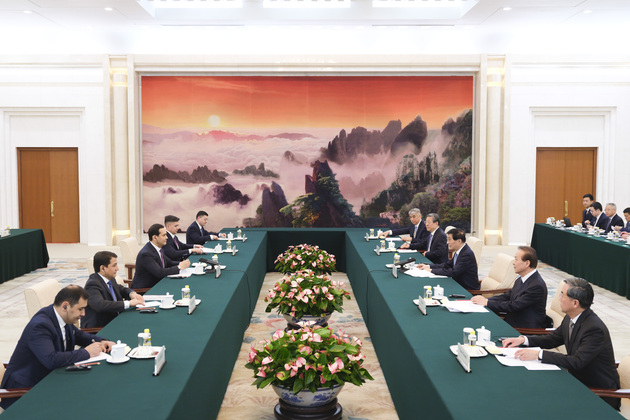 CHINA-BEIJING-WANG HUNING-UZBEKISTAN PRESIDENTIAL ADVISOR-MEETING (CN)