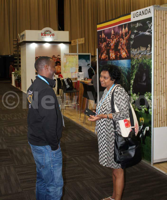   gandas mos ekesa disccusing business with a potential buyer at the gandan stall ekesa is among the 11 gandan tour operators who attended the event