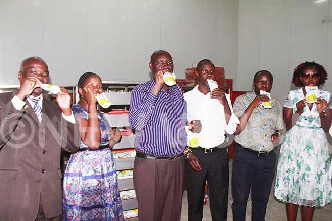  oard members testing the juice at the factory