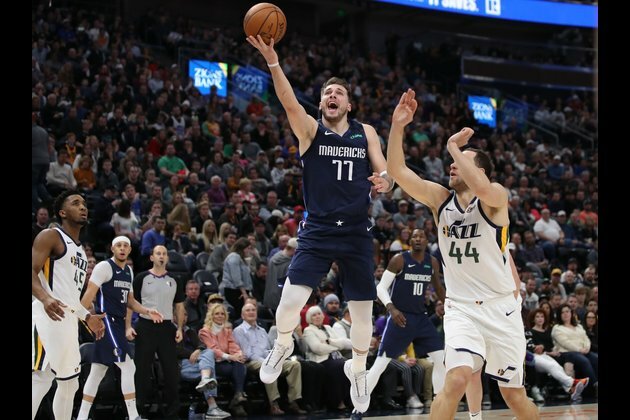 Gobert leads surging Jazz to win over Mavs