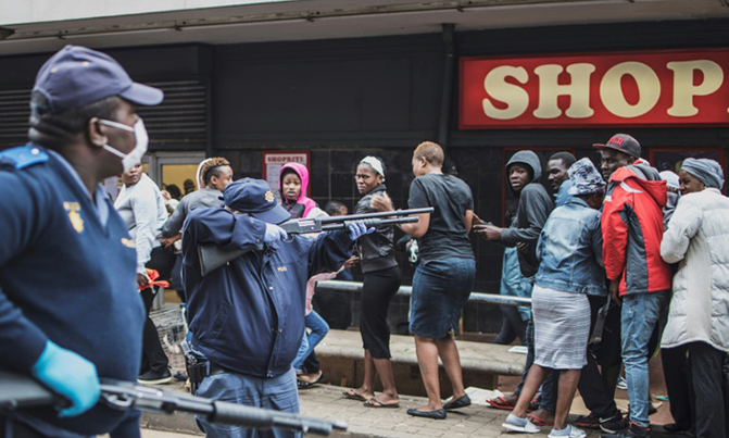 S.African police fire rubber bullets at shoppers during lockdown S.African police fire rubber bullets at shoppers during lockdown