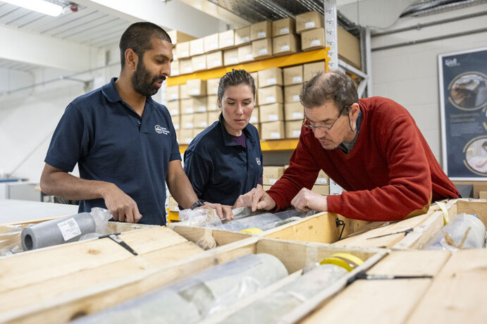 BGS geologists studying the core in the National Geological Repository
