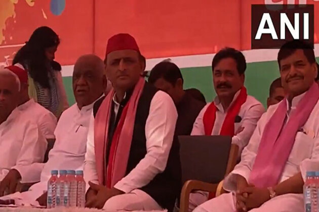 SP chief Akhilesh Yadav takes part in Holi celebrations at party office in Saifai