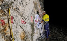 Black Cat geologist Sam Bruce conducting underground mapping and sampling