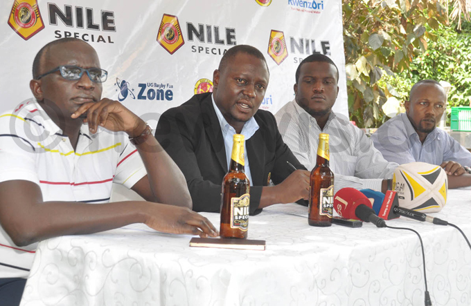   eneral ecretary odwin ayangwe 2nd  addresses a press conference flanked by ile pecial brand manager saac ekasi   ugby ranes captain rian dongo and coach nthony inene  during the launch hoto by ichael subuga