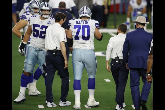 Cowboys G Martin leaves game after concussion