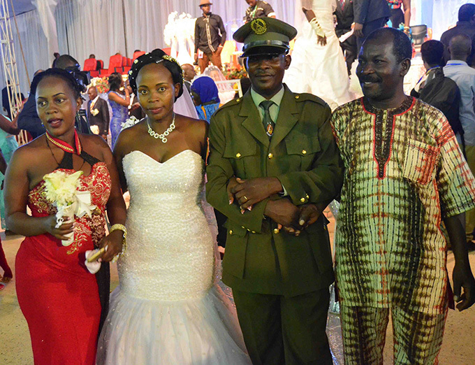  orporal avid eeya with his wife essica angooba and friends after taking vows 