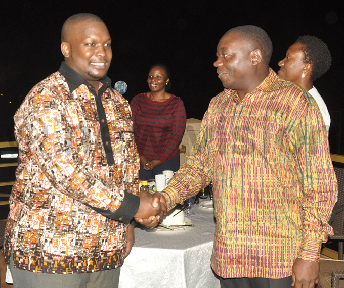  rince junju iwewa shakes hands with  president ohnson molo hoto by ichael subuga