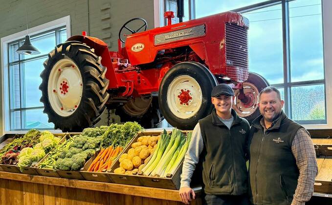 Harley and James Robertshaw at Robertshaw's Farm Shop in Skipton. In the background is a vintage McCormick international tractor, manufactured in Bradford, and making a nostalgic return to the premises where it previously took pride of place.