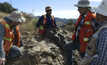 ﻿Azure Minerals geologists on Mesa de Plata outcrop