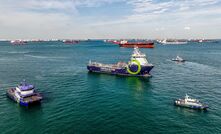 The Fortescue Green Pioneer at sea off Singapore.