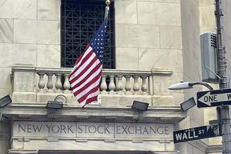 Dow Jones jumps 272 points as Nasdaq Composite dips 34 points