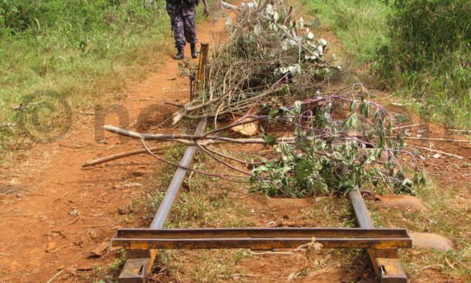 Tension as workers block railway line over pay Tension as workers block railway line over pay