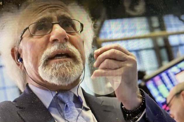 Fed lowers interest rates, stocks close mixed, dollar jumps