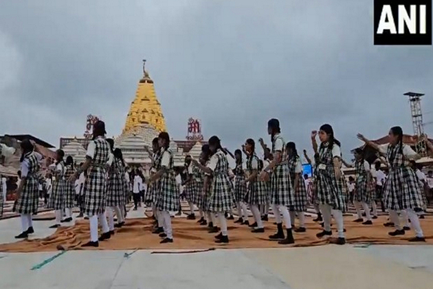 Participants of International Yoga Day perform Yoga and garba at Ambaji Temple in Gujarat's Banaskantha