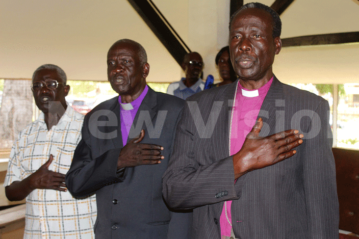 etired bishop of ukedi region ecodemus kile left and other religious leaders singing the teso anthem
